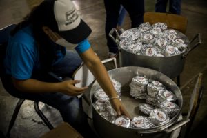 Venezolanos celebran el "Día Mundial de la Arepa". Foto EFE